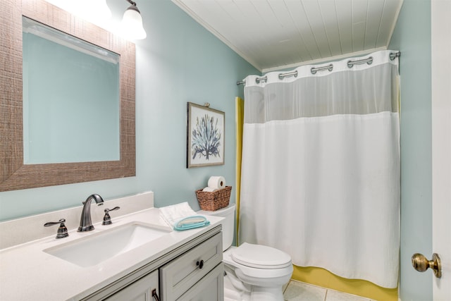 bathroom with vanity, crown molding, tile patterned flooring, toilet, and curtained shower