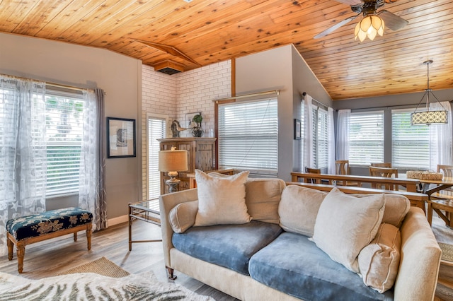 living room with ceiling fan, wooden ceiling, lofted ceiling, and light wood-type flooring