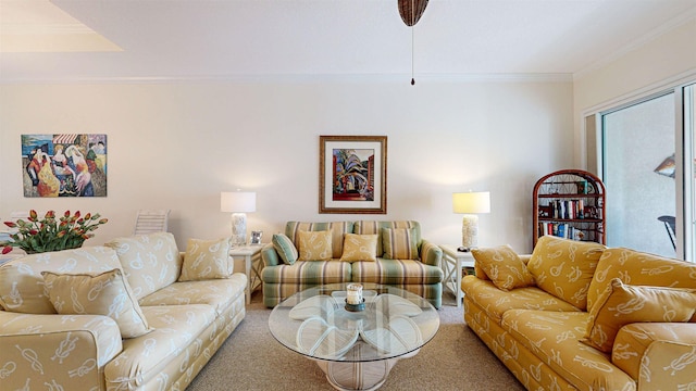 carpeted living room with ornamental molding