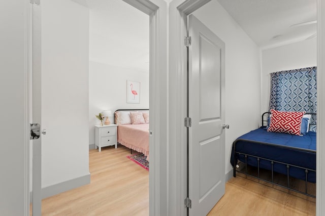 bedroom featuring light wood finished floors