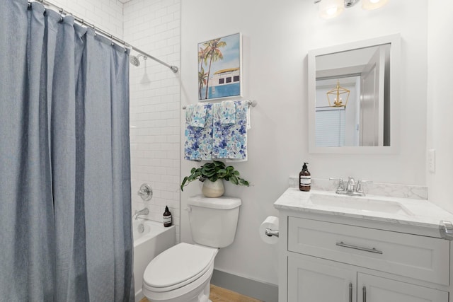 full bathroom with toilet, wood finished floors, vanity, shower / bath combination with curtain, and baseboards