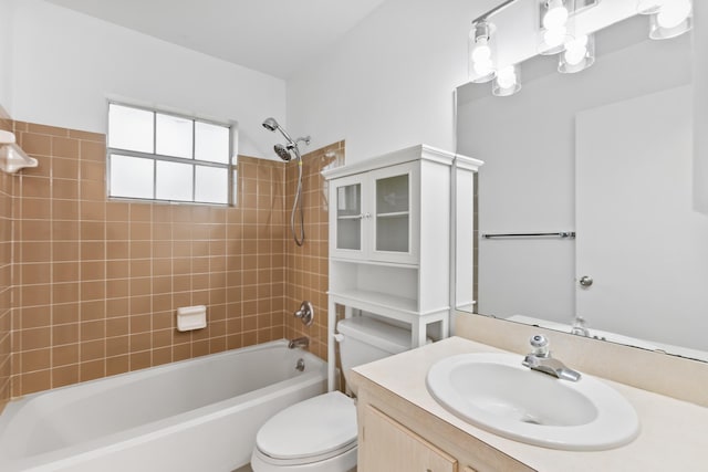 full bath featuring vanity, bathtub / shower combination, and toilet