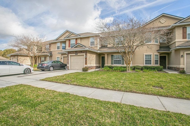 view of property featuring a front yard