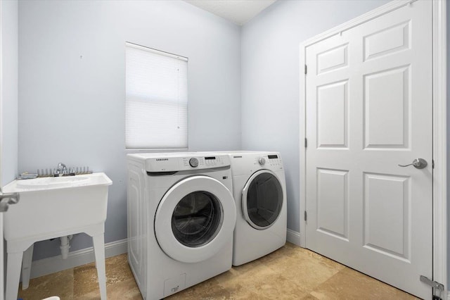 laundry room featuring washer and dryer