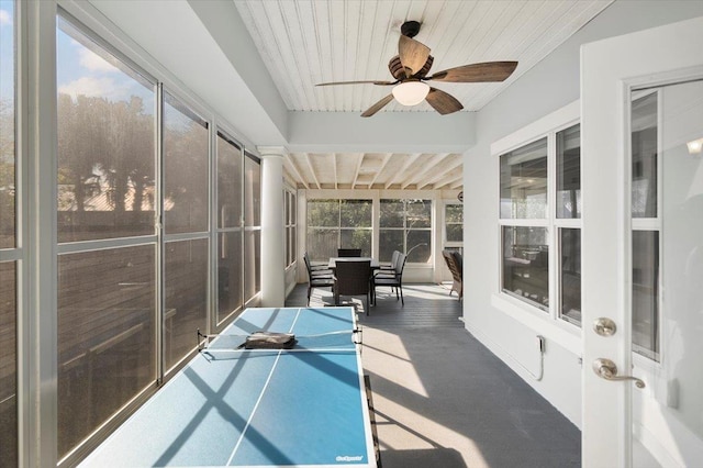 sunroom featuring wooden ceiling and ceiling fan