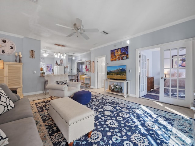 84 Seascape Cir, Saint Augustine, FL 32080 - living room with crown molding, ceiling fan, french doors, and baseboards