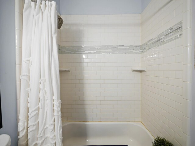 84 Seascape Cir, Saint Augustine, FL 32080 - bathroom featuring shower / bathtub combination with curtain