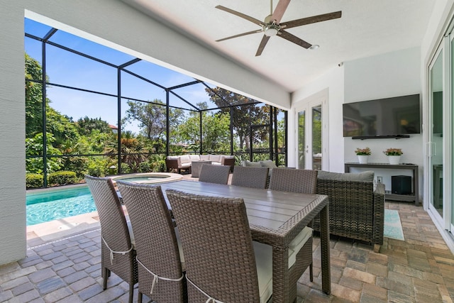 view of patio with outdoor lounge area and a lanai