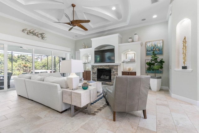 living room with a fireplace, ornamental molding, coffered ceiling, ceiling fan, and beam ceiling