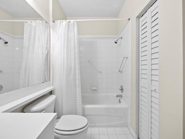 bathroom with toilet, tile patterned floors, and shower / bath combo with shower curtain