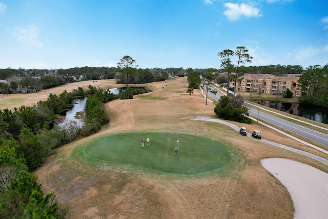 surrounding community with a water view