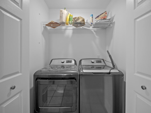 laundry room featuring laundry area and separate washer and dryer