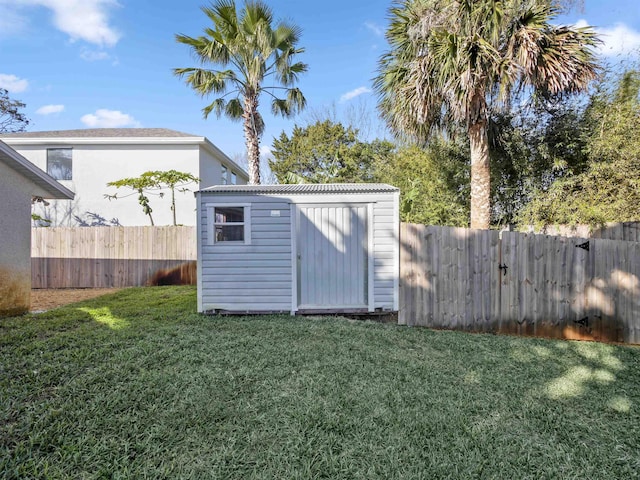 view of shed featuring a fenced backyard