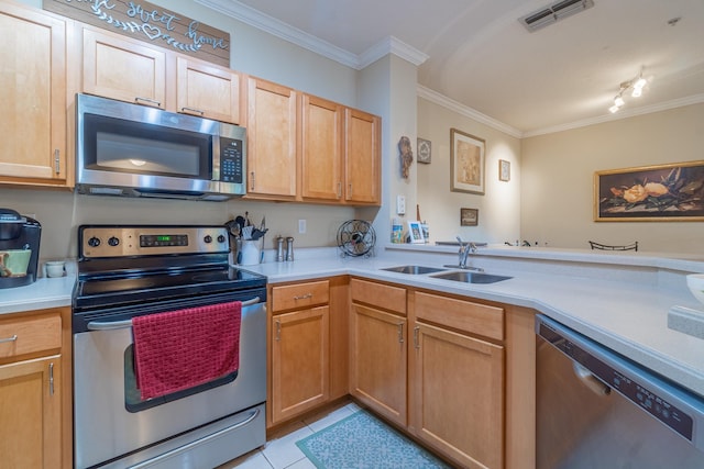 kitchen featuring stainless steel appliances, ornamental molding, light tile patterned floors, and sink