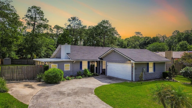 11428 Rustic Pines Cir, Jacksonville, FL 32257 - view of front facade with stone siding, driveway, an attached garage, and a chimney
