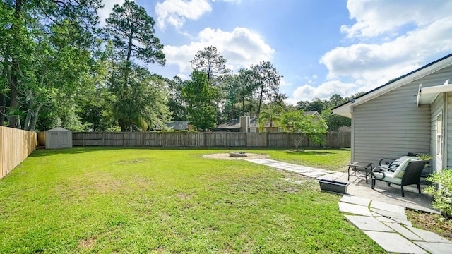 11428 Rustic Pines Cir, Jacksonville, FL 32257 - view of yard with an outdoor fire pit and a patio area