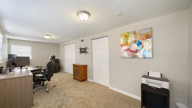 11428 Rustic Pines Cir, Jacksonville, FL 32257 - office with light carpet, a textured ceiling, and baseboards