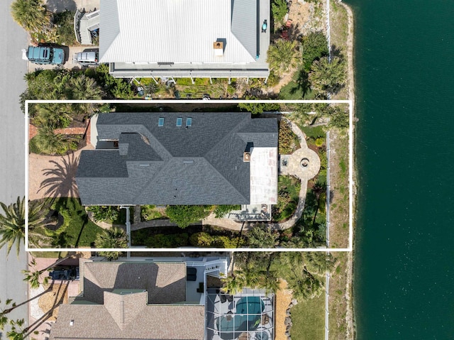 drone / aerial view featuring a water view