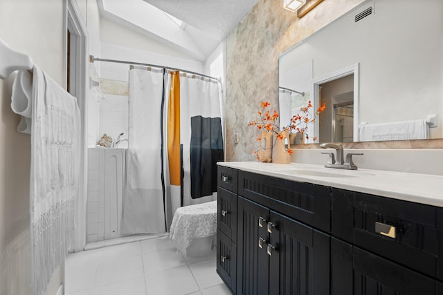 bathroom with tile patterned flooring, visible vents, curtained shower, lofted ceiling, and vanity