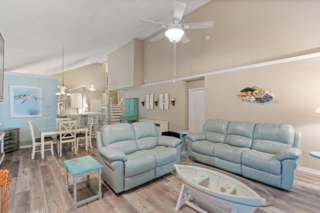 362 Monika Pl, Saint Augustine, FL 32080 - living room featuring hardwood / wood-style floors, ceiling fan with notable chandelier, and high vaulted ceiling