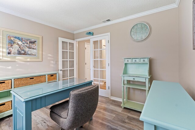 362 Monika Pl, Saint Augustine, FL 32080 - office space with crown molding, wood-type flooring, a textured ceiling, and french doors