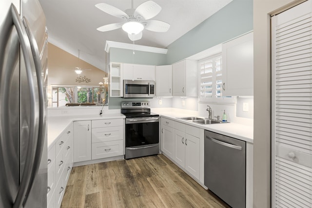 362 Monika Pl, Saint Augustine, FL 32080 - kitchen featuring dark wood-type flooring, sink, ceiling fan, stainless steel appliances, and white cabinets