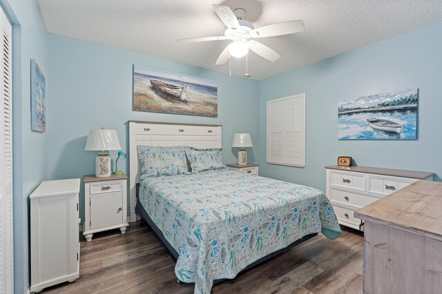 362 Monika Pl, Saint Augustine, FL 32080 - bedroom with ceiling fan, a textured ceiling, and dark hardwood / wood-style flooring