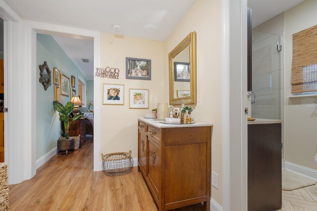 corridor featuring light hardwood / wood-style flooring