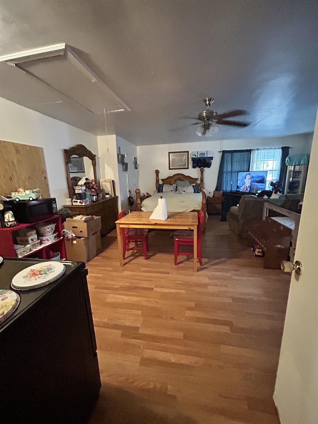 bedroom with hardwood / wood-style flooring