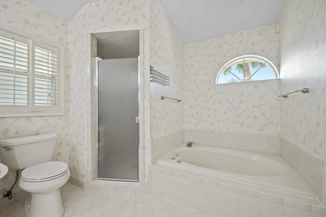 bathroom featuring tile patterned flooring, a garden tub, a shower stall, and wallpapered walls