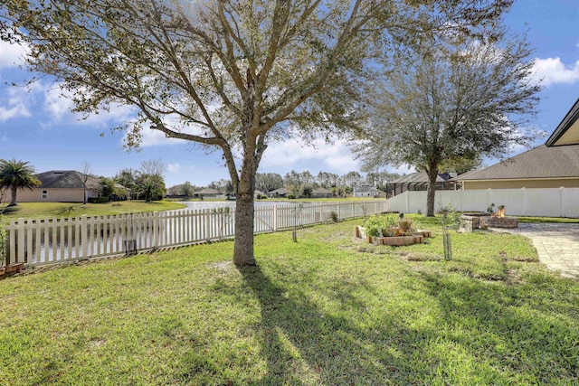 view of yard featuring a fenced backyard