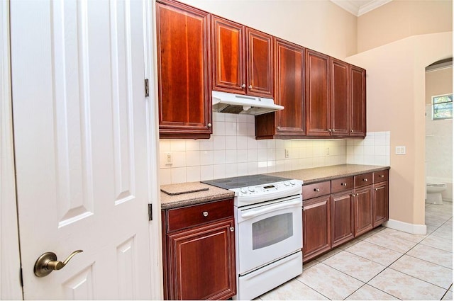 kitchen featuring decorative backsplash, ornamental molding, light tile patterned floors, stone counters, and white electric range