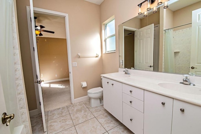 bathroom featuring ceiling fan, tile patterned flooring, toilet, vanity, and a shower with shower curtain