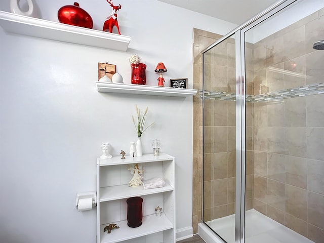 full bathroom featuring a shower stall