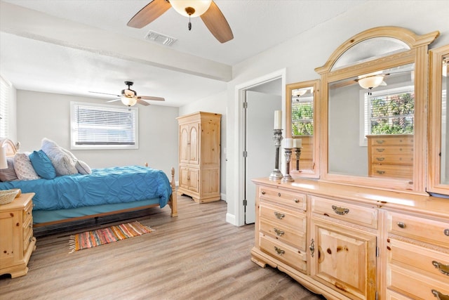 bedroom featuring ceiling fan and light wood-type flooring