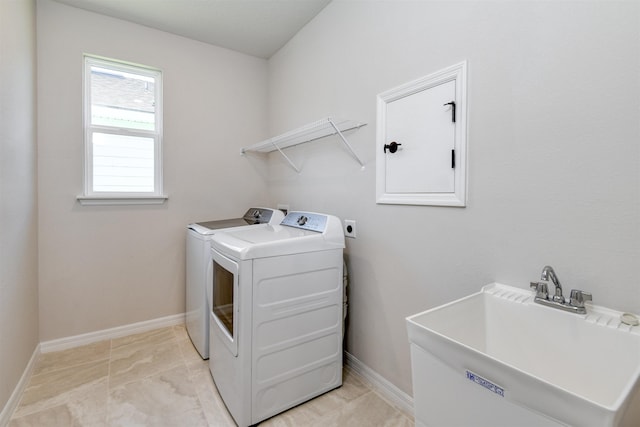 29 Turkey Trot Ct, Saint Augustine, FL 32095 - washroom with independent washer and dryer, baseboards, a sink, and laundry area
