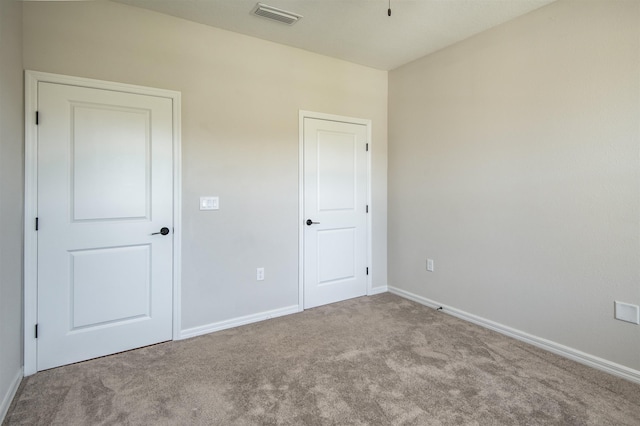 29 Turkey Trot Ct, Saint Augustine, FL 32095 - unfurnished bedroom with baseboards, visible vents, and carpet floors