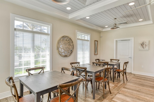 29 Turkey Trot Ct, Saint Augustine, FL 32095 - dining space with a tray ceiling, ornamental molding, light wood-type flooring, wood ceiling, and baseboards