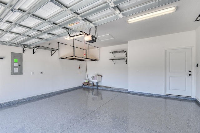 29 Turkey Trot Ct, Saint Augustine, FL 32095 - garage with electric panel, baseboards, and a garage door opener