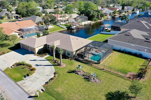 aerial view featuring a water view and a residential view