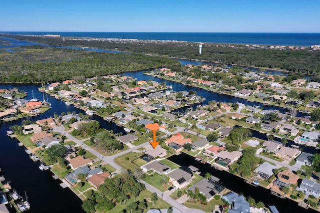 bird's eye view with a water view and a residential view