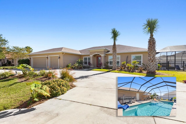 view of front of property featuring a garage, a front yard, an outdoor pool, and stucco siding