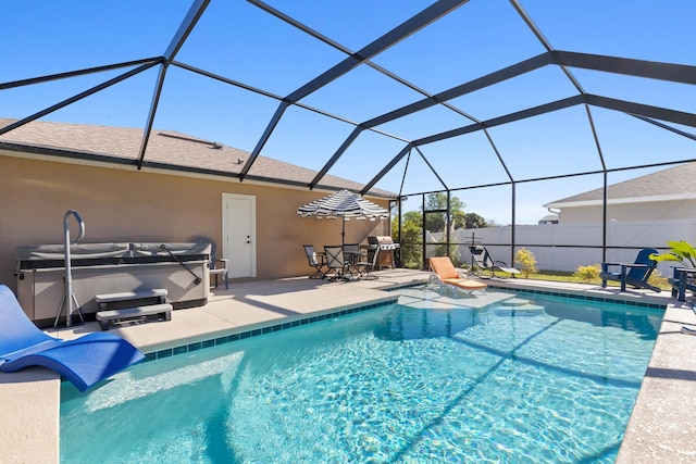 view of swimming pool featuring fence, a grill, a fenced in pool, a patio area, and a hot tub