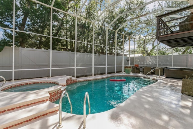 4 Santa Maria Ln, Saint Augustine, FL 32080 - view of swimming pool with a patio, a fenced backyard, and a pool with connected hot tub