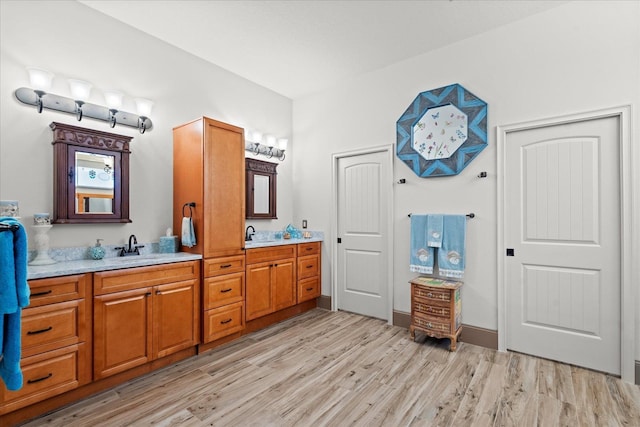 3 Menorca Way, Palm Coast, FL 32137 - full bath with double vanity and wood finished floors