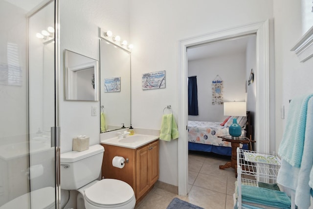 8961 A1A, Saint Augustine, FL 32080 - ensuite bathroom with vanity, tile patterned flooring, and a shower stall