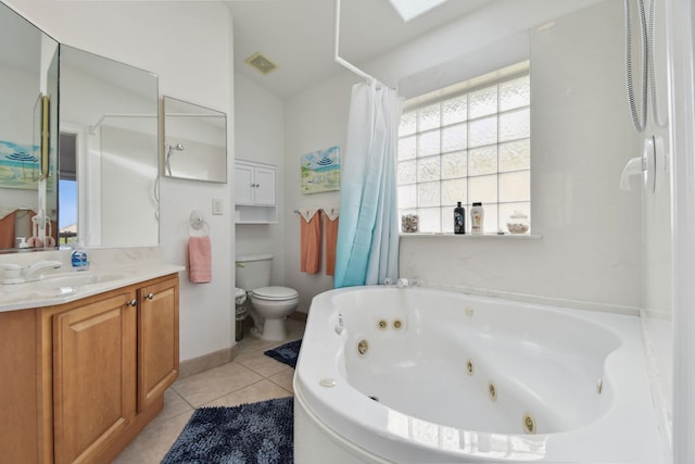 8961 A1A, Saint Augustine, FL 32080 - full bath with a jetted tub, vanity, and tile patterned floors