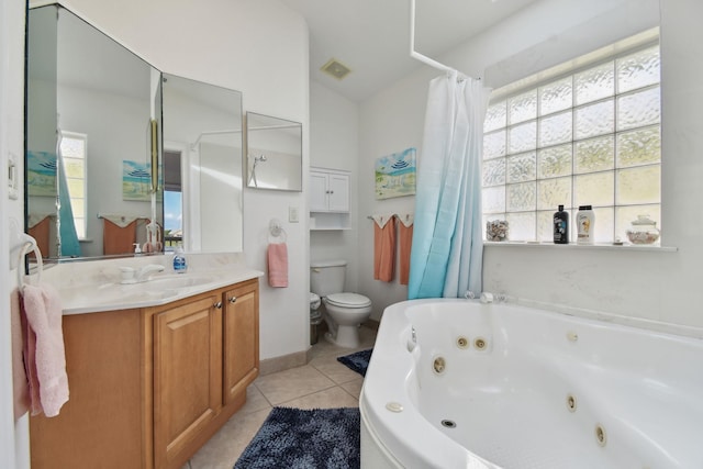 8961 A1A, Saint Augustine, FL 32080 - bathroom featuring a whirlpool tub, tile patterned floors, and vanity