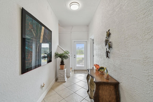 8961 A1A, Saint Augustine, FL 32080 - doorway featuring light tile patterned floors and a textured wall