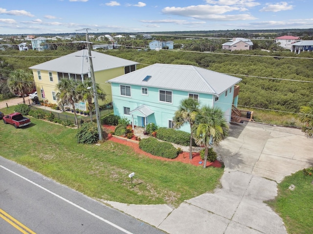 8961 A1A, Saint Augustine, FL 32080 - view of front of property with concrete driveway and a metal roof